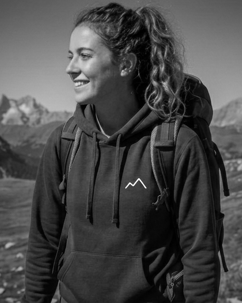 The Hoodie worn on a mountain trail